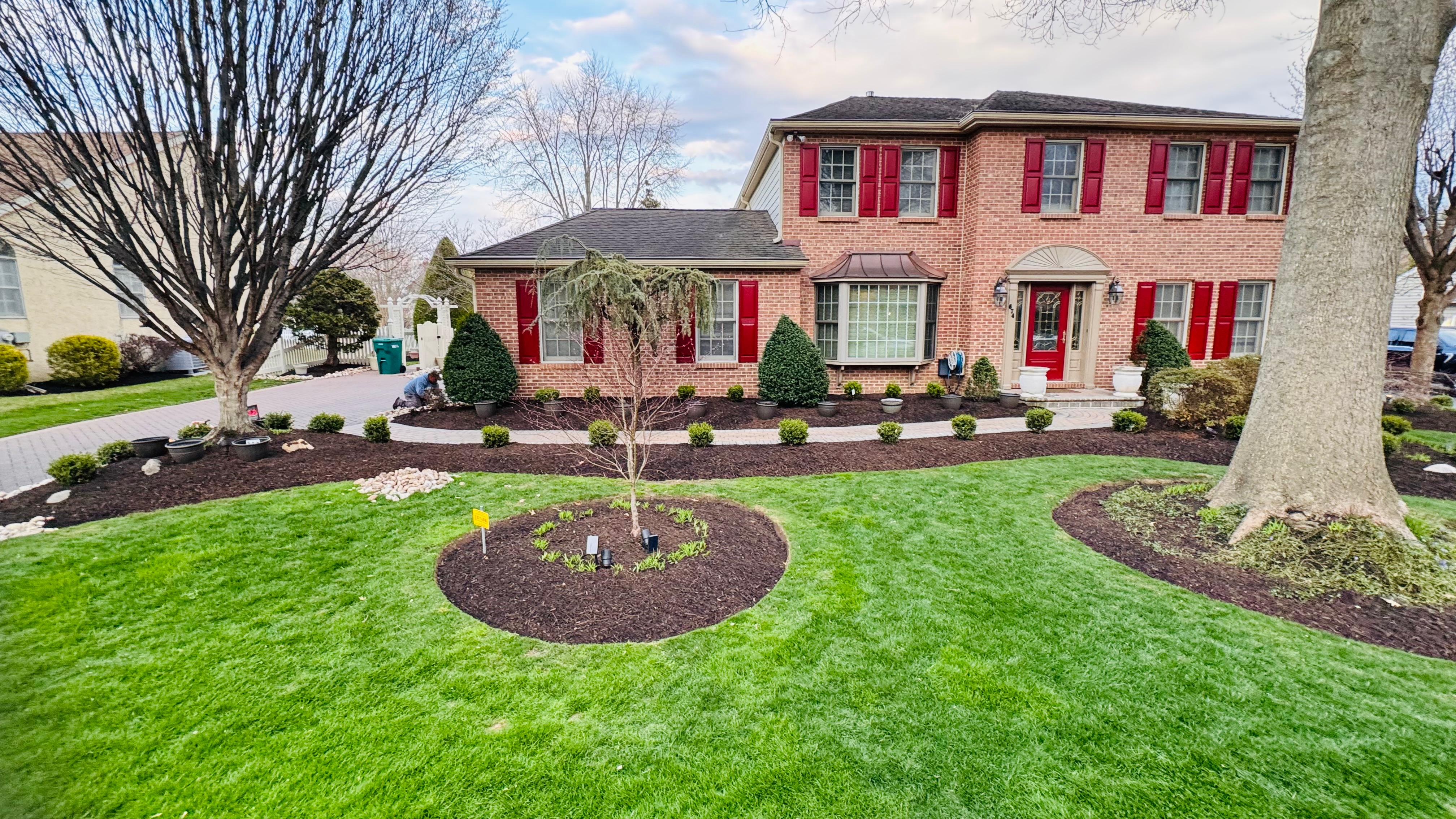 Finished front yard landscaping and mulch project