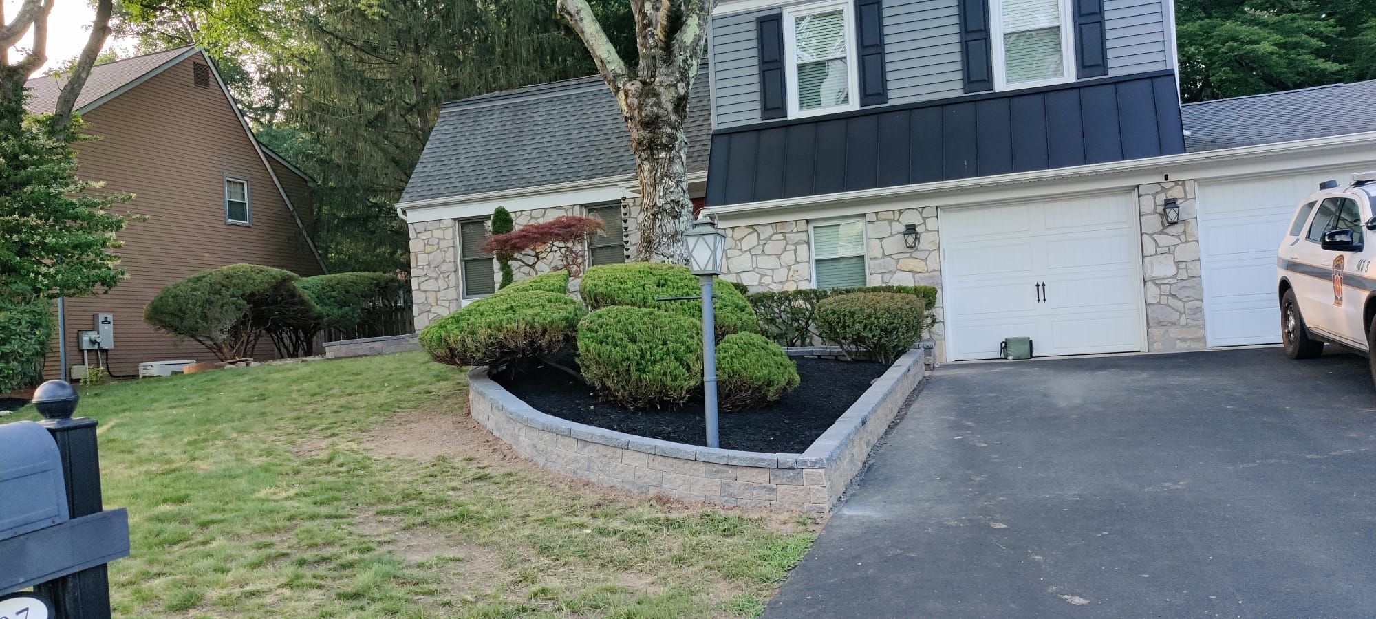 Front yard retaining wall and mulch project
