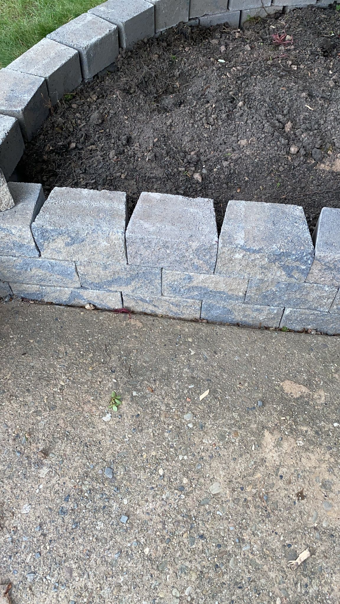 Retaining wall construction detail showing site preparation